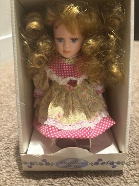 Porcelain Doll with Blonde Curls in Pink & Yellow Floral Dress